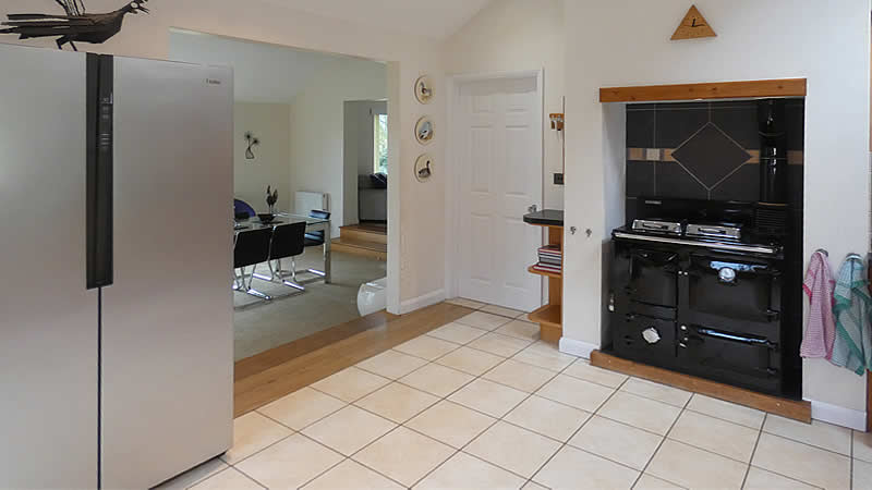 Kitchen leading into dining area