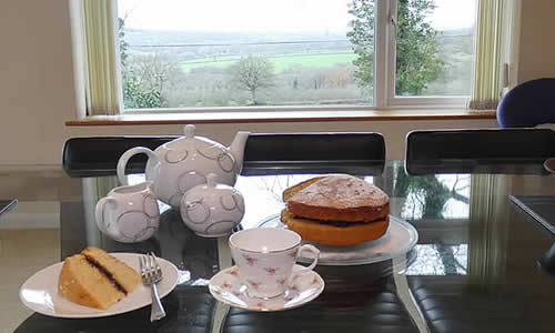 Tea and homemade cake welcome our guests
